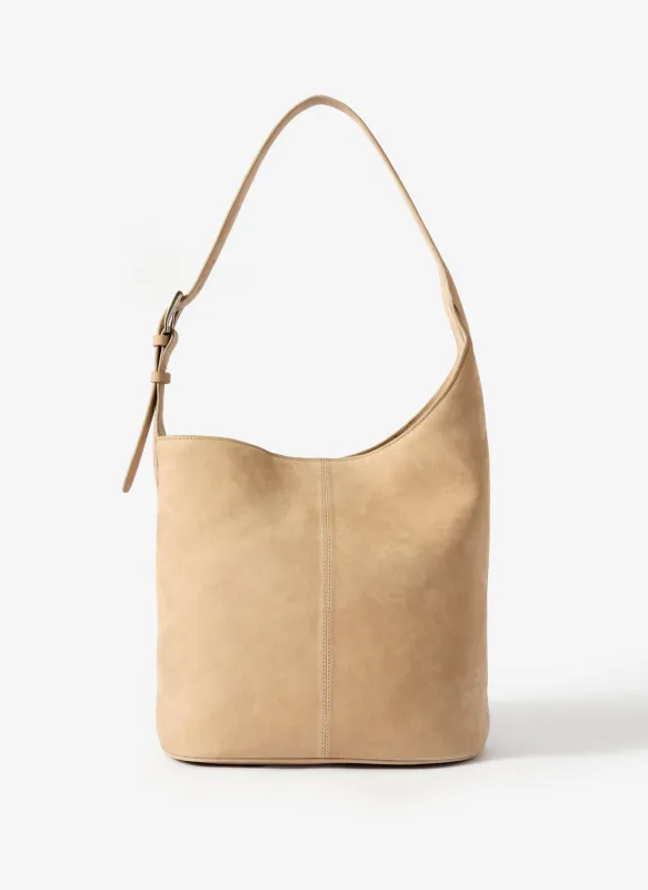 Alexa Neutral Suede Bucket Bag sold by Mint Velvet