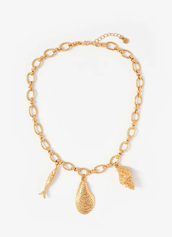 Gold Tone Shell Statement Charm Necklace sold by Mint Velvet