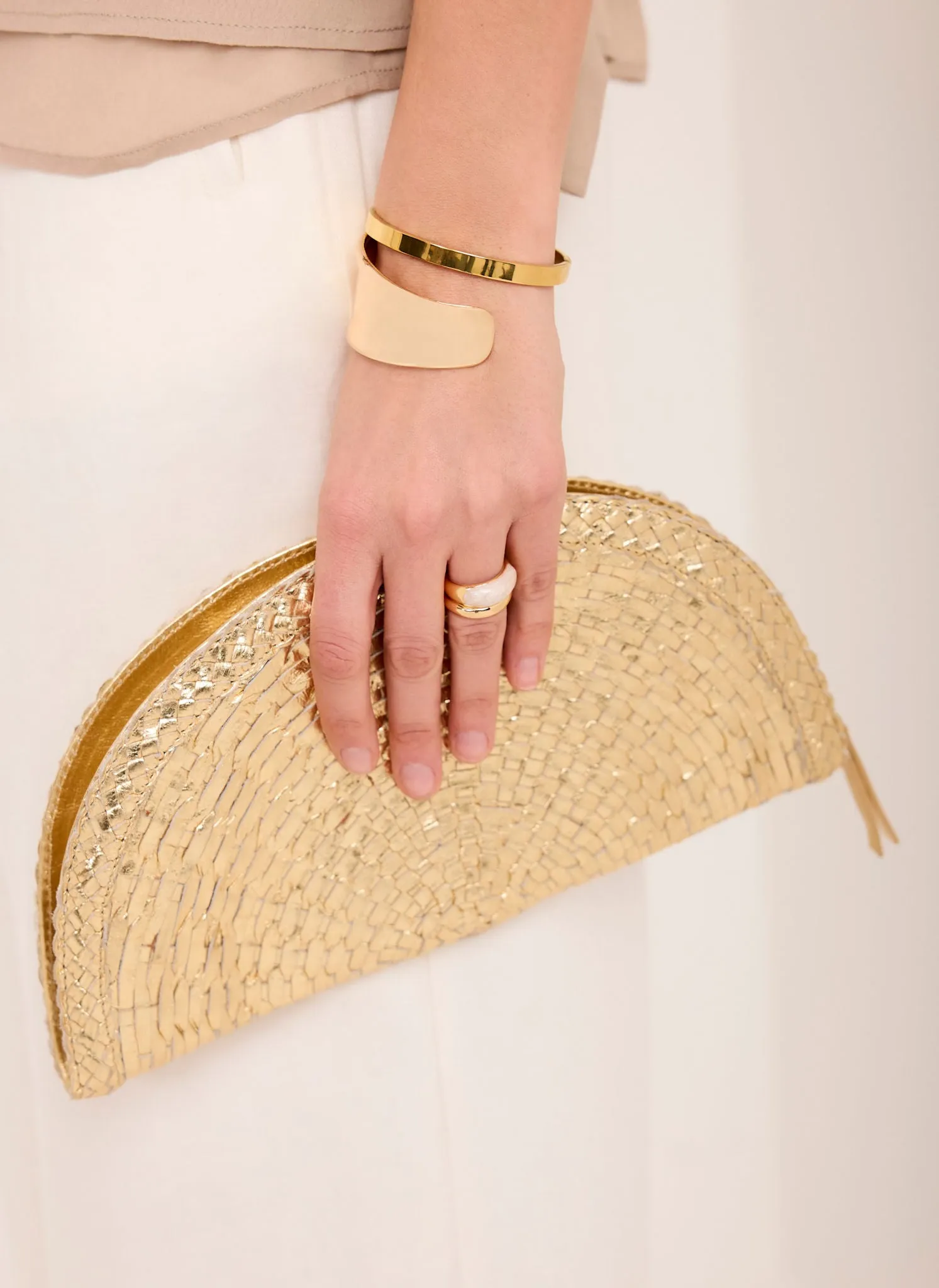 Bea Gold Leather Woven Clutch sold by Mint Velvet