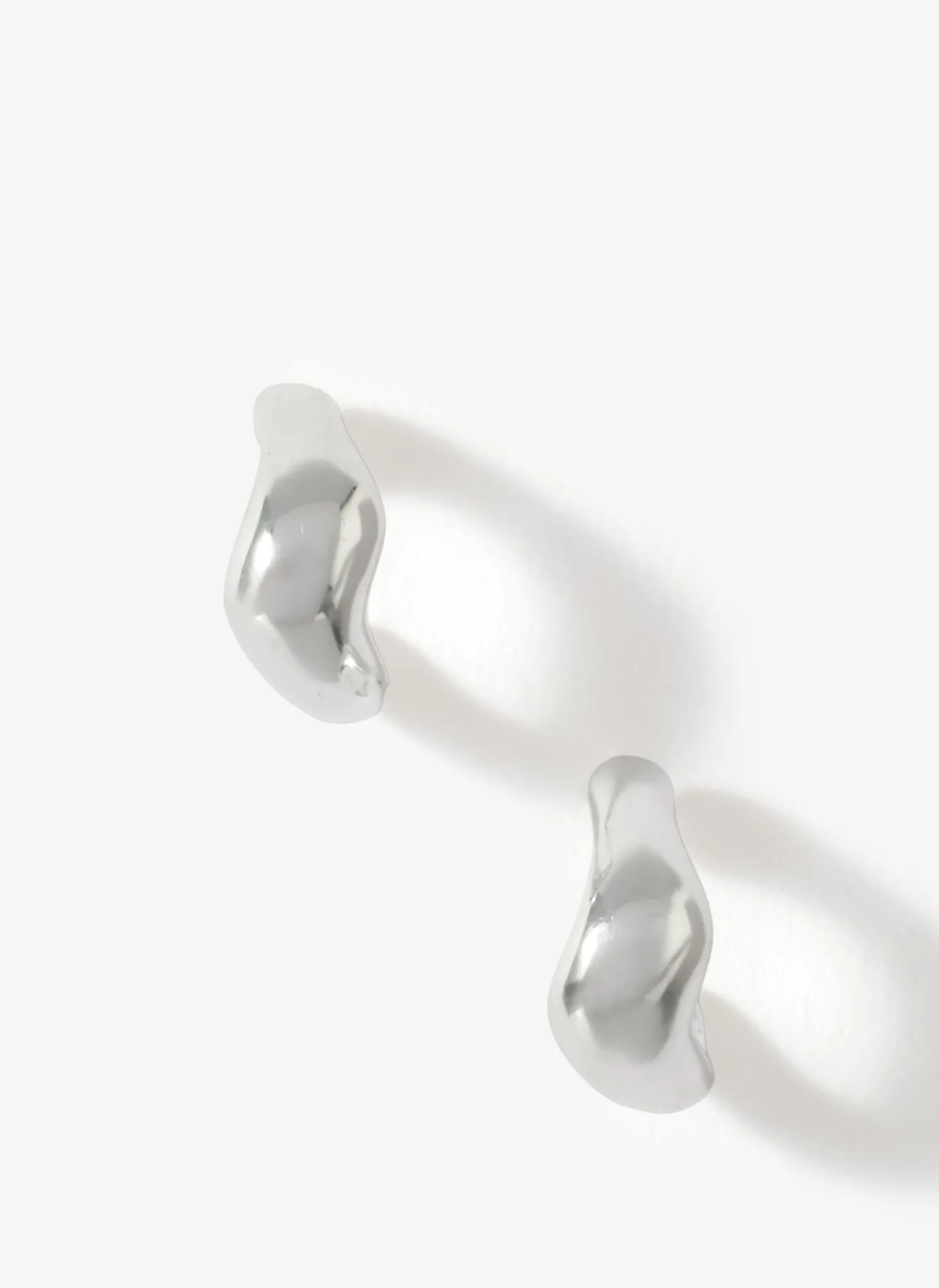 Silver Plated Wave Mini Hoops sold by Mint Velvet