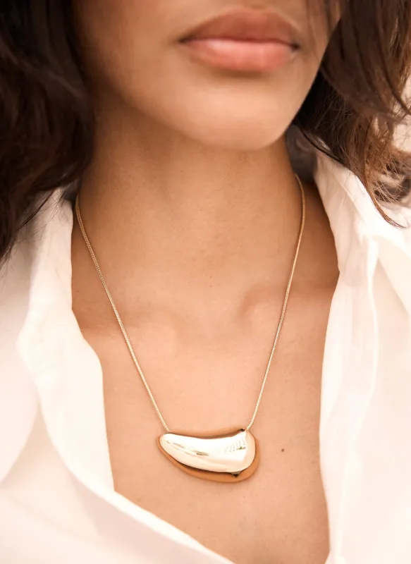 Gold Tone Pebble Pendant Necklace made by Mint Velvet