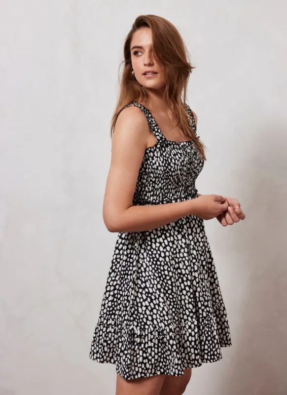 Black Print Ruffle Mini Dress sold by Mint Velvet