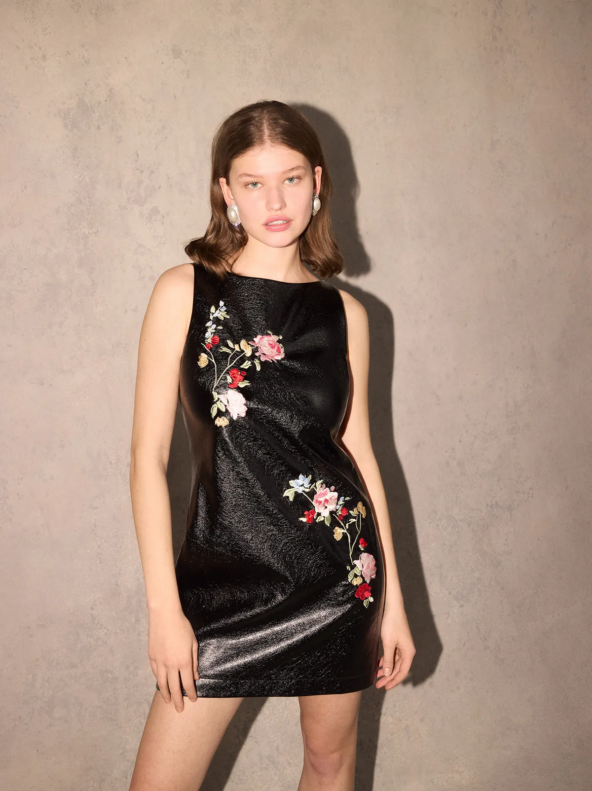 Carolyn Black Embroidered Vinyl Mini Dress sold by KITRI Studio