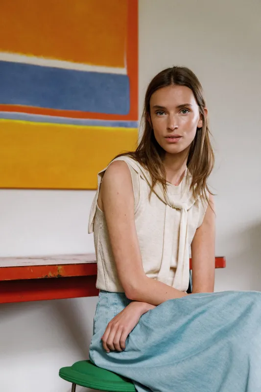 [CL] VEST WITH TIED SWEATER DETAIL sold by Indi & Cold