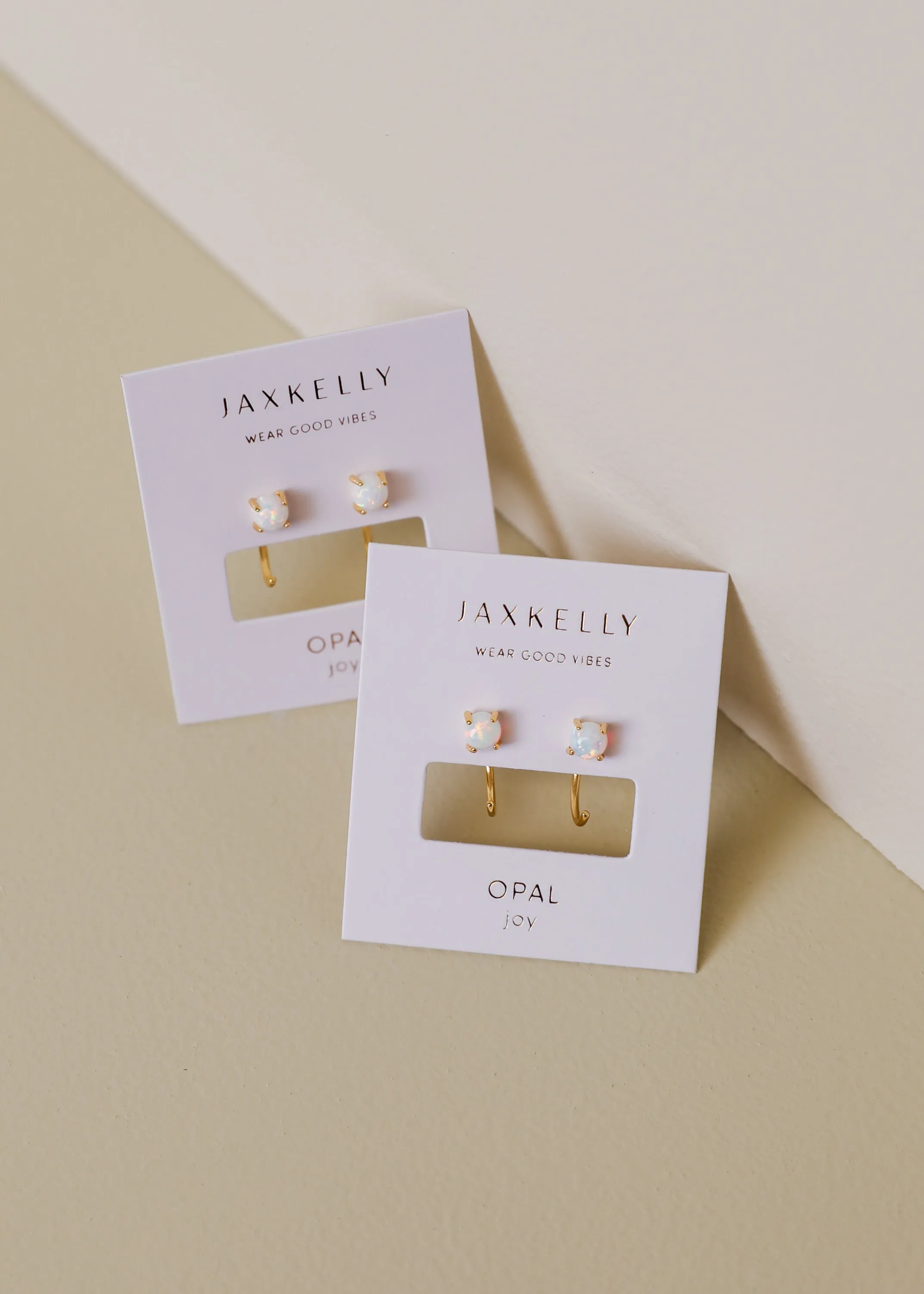 White Opal Huggie sold by JaxKelly