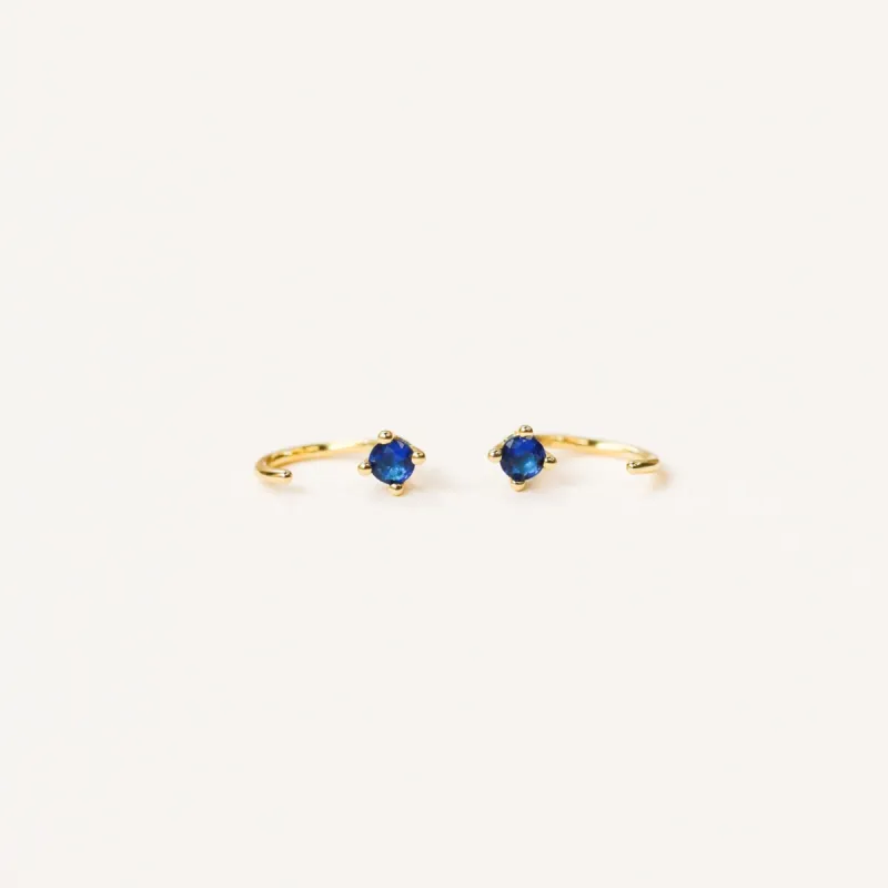 Sapphire Huggie sold by JaxKelly