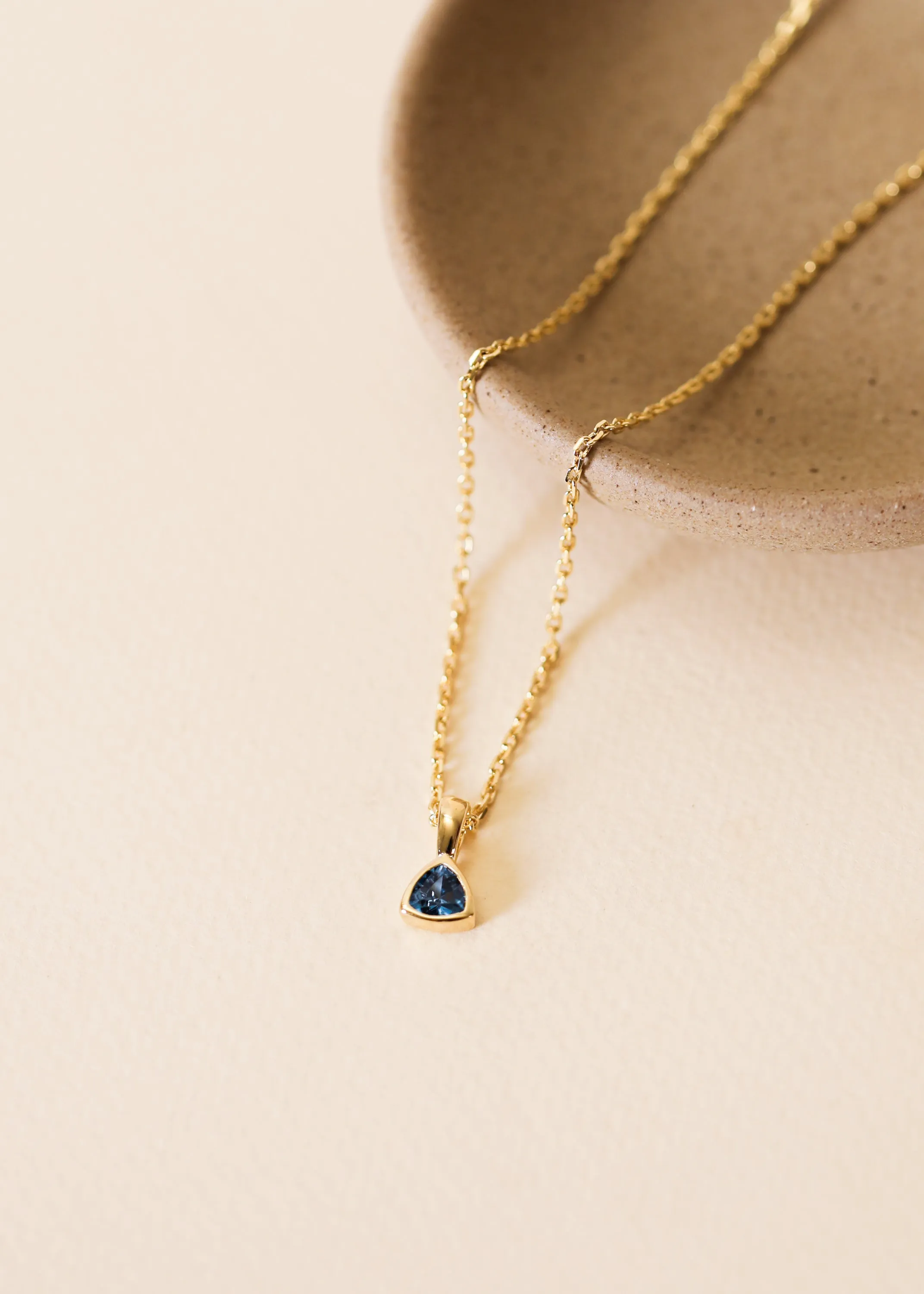Blue Rounded Corner Triangle Pendant Necklace sold by JaxKelly