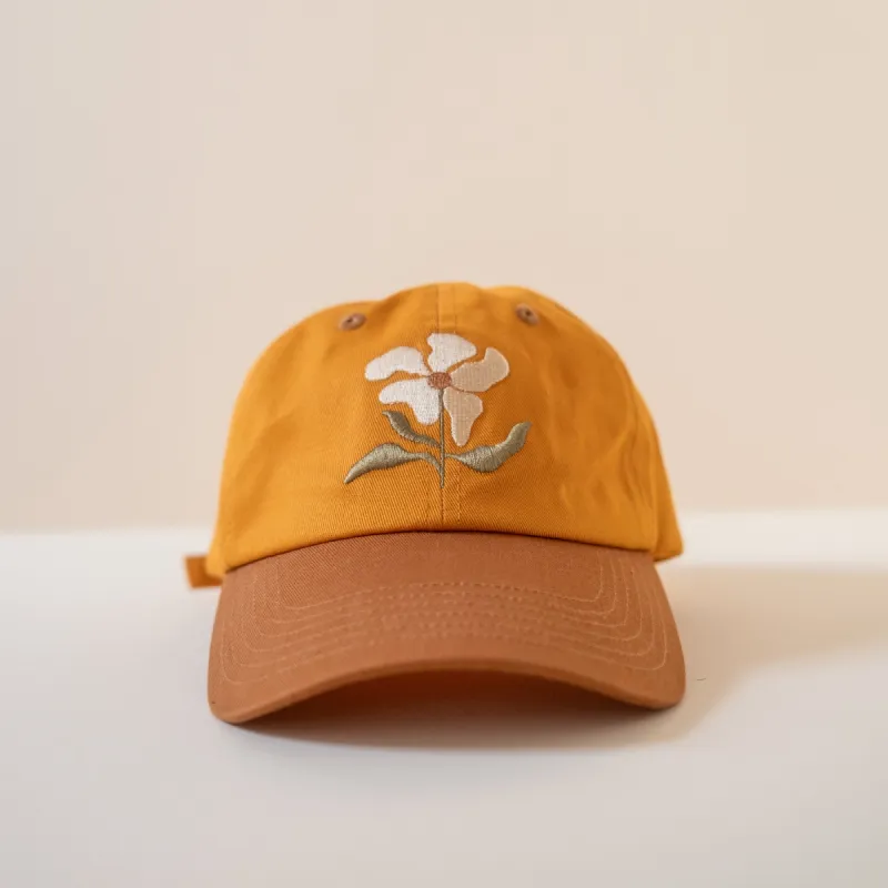 Flower cap sold by Cai & Jo