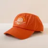 I love it here cap sold by Cai & Jo