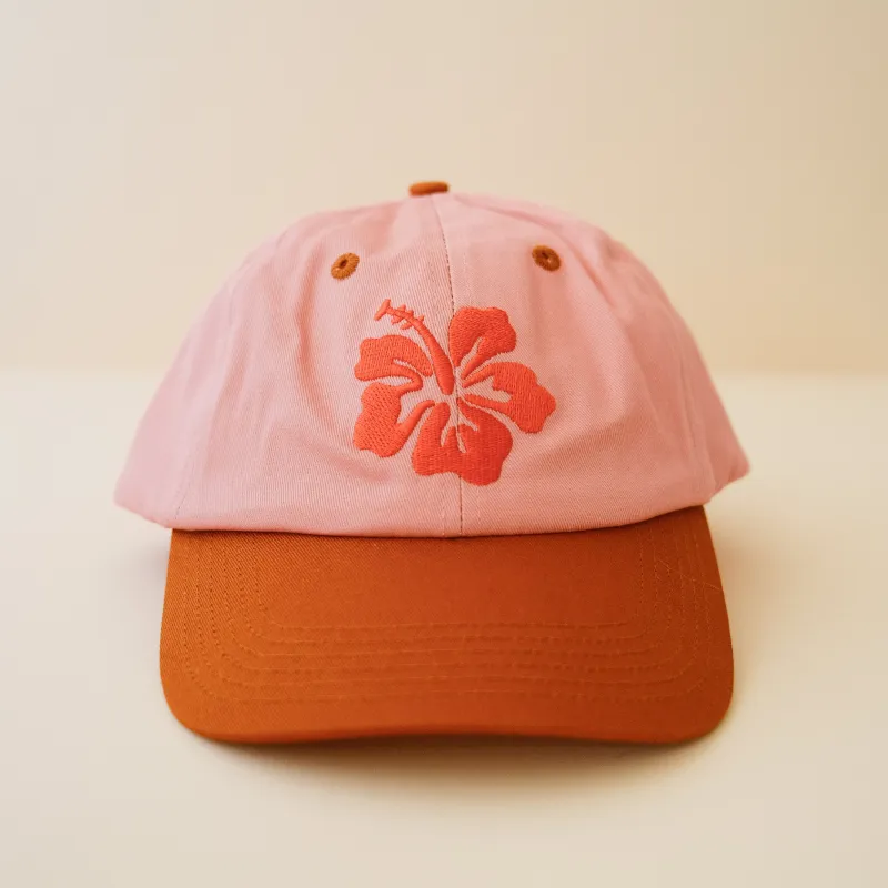 Hibiscus embroidered cap sold by Cai & Jo