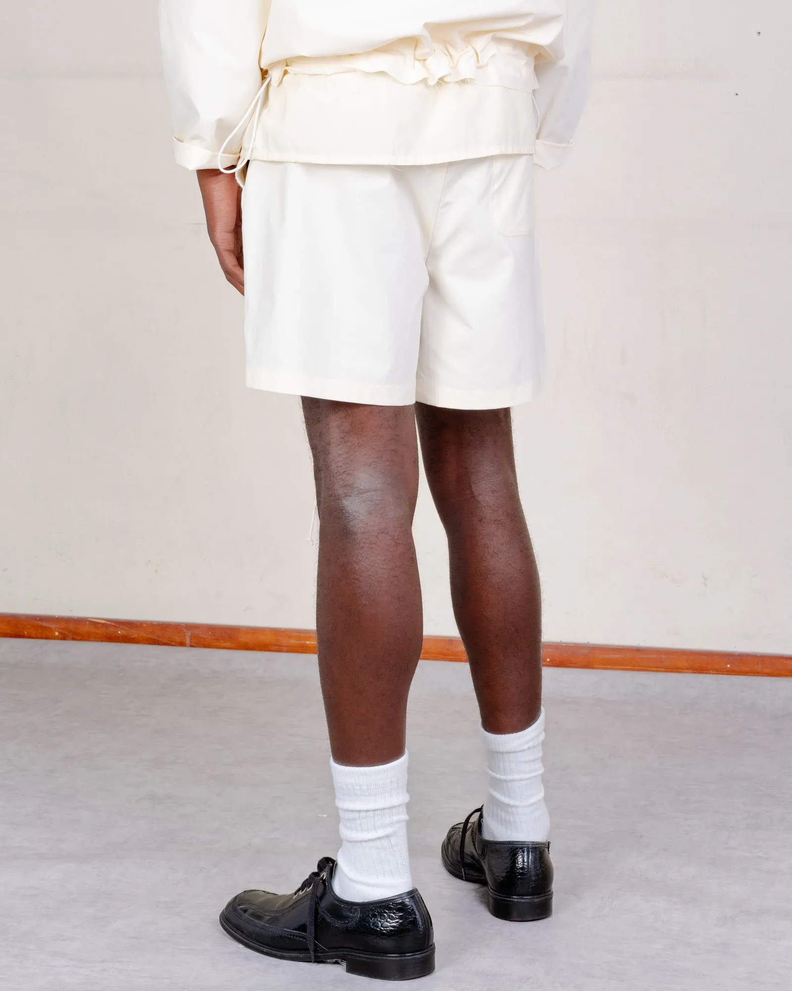 CF.21.13.01.06 KNEE SHORTS technical nylon light yellow sold by Camiel Fortgens