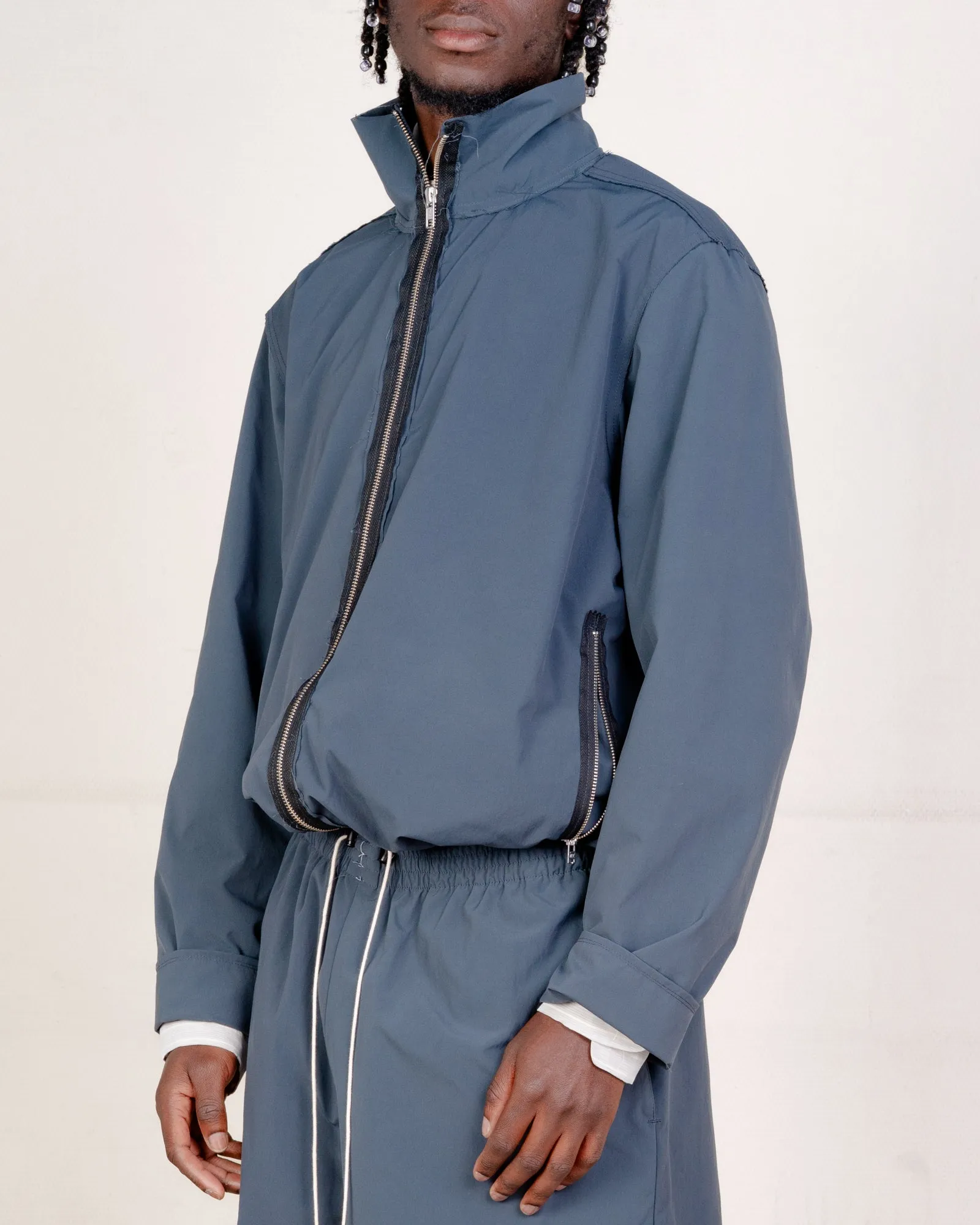 CF.21.09.02.01 TRACK JACKET technical nylon petrol sold by Camiel Fortgens