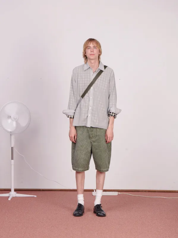 CF.23.15.01.01 WIDE SHORTS coated denim green made by Camiel Fortgens