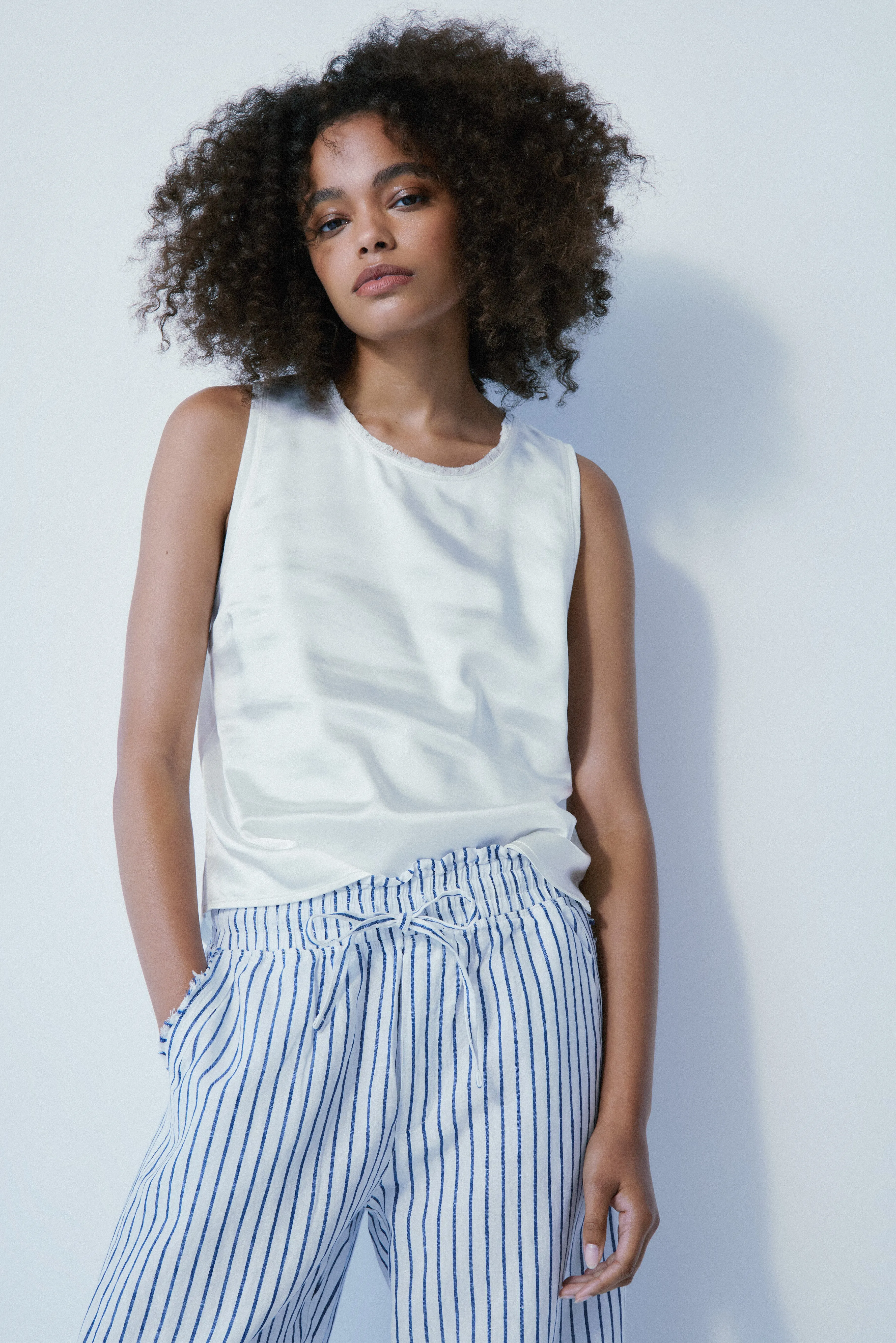 Sienna off white satin top sold by MELISSA NEPTON