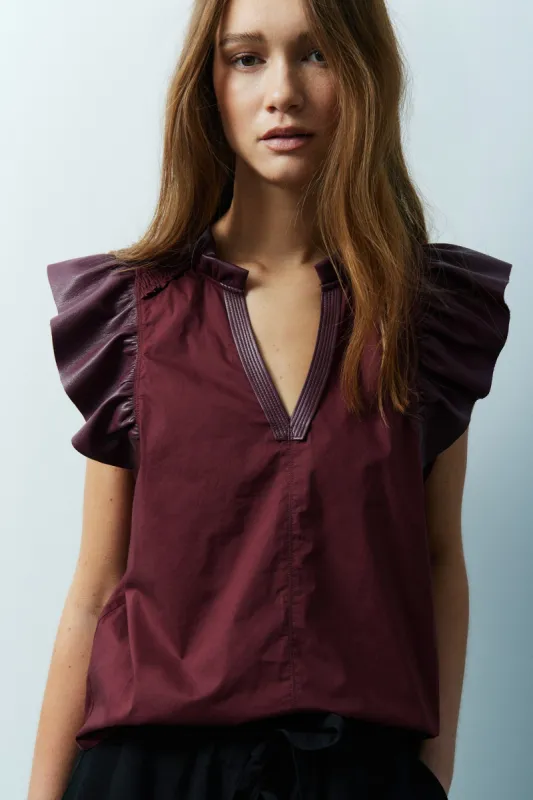 Reese cotton and faux leather blouse sold by MELISSA NEPTON
