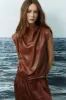 Honore faux leather top sold by MELISSA NEPTON