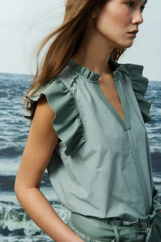 Reese cotton and faux leather blouse sold by MELISSA NEPTON