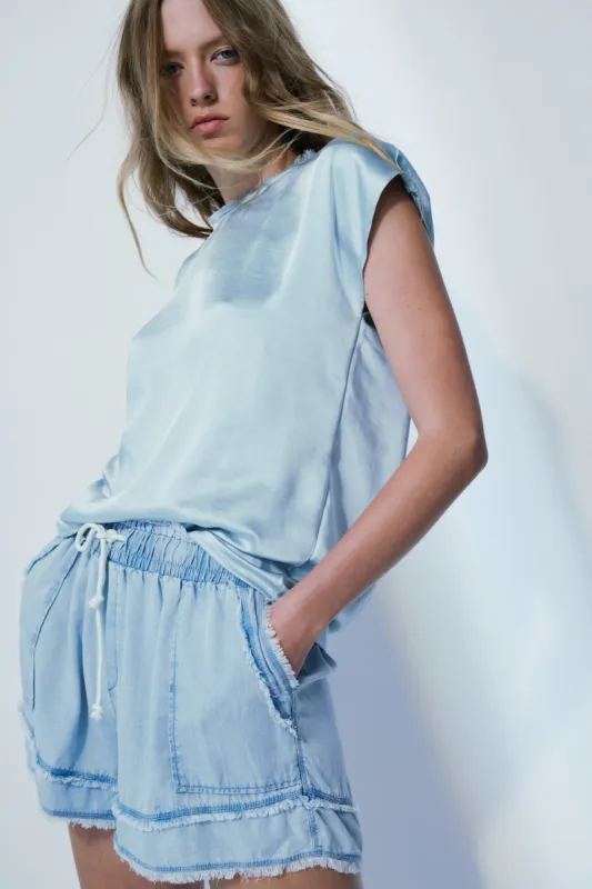 Willow sparkling green satin tee sold by MELISSA NEPTON