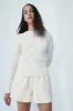 Drew pale blush knit sweater sold by MELISSA NEPTON