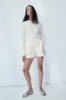 Drew pale blush knit sweater sold by MELISSA NEPTON