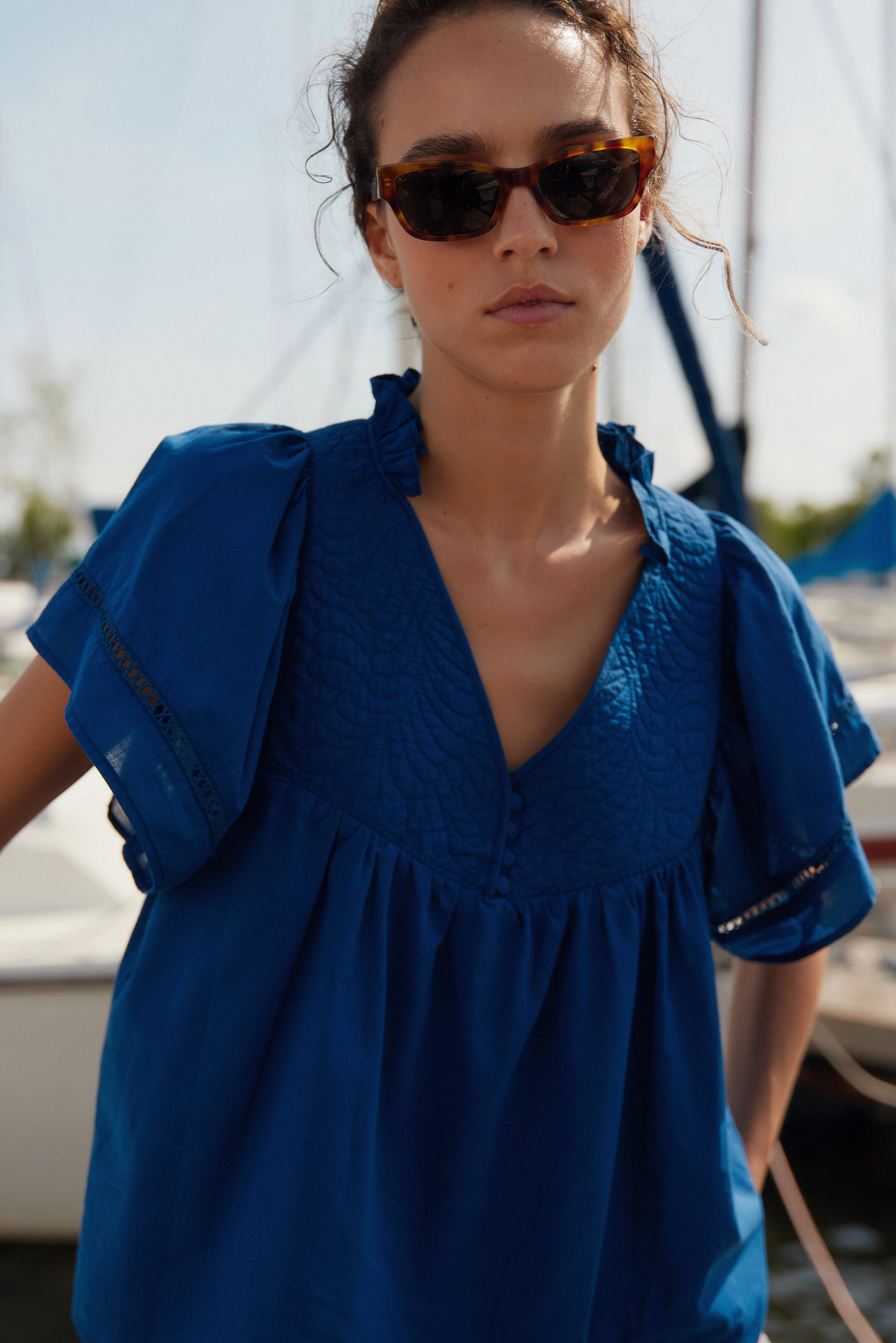 Emily travel blue cotton blouse sold by MELISSA NEPTON