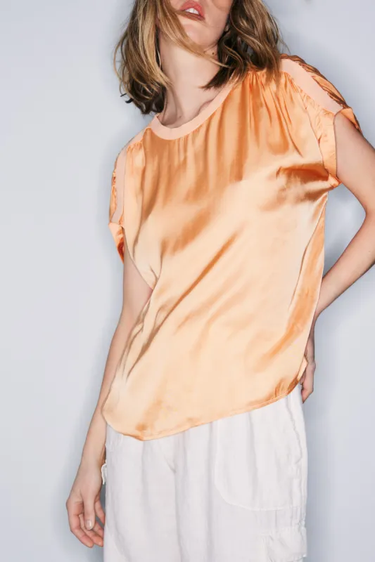 Lima tangerine top sold by MELISSA NEPTON