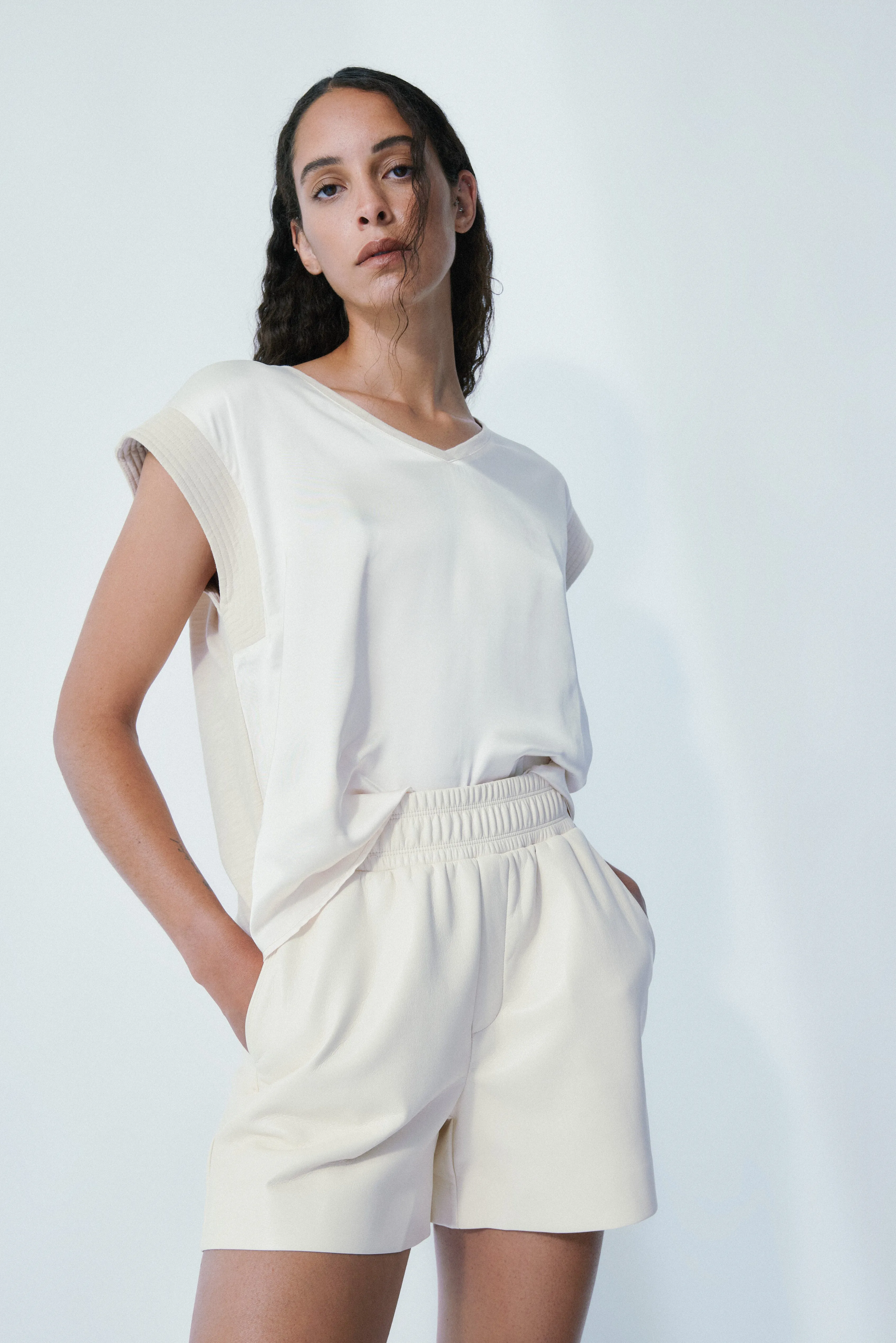 Lilo faux leather cream short sold by MELISSA NEPTON