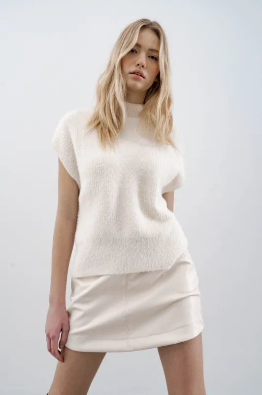 Mikia cream faux leather skirt sold by MELISSA NEPTON