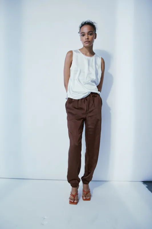 Cary light brown satin jogger sold by MELISSA NEPTON