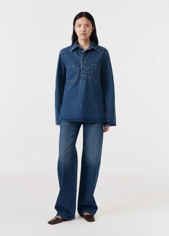 Curved denim pull on shirt sold by Bite Studios