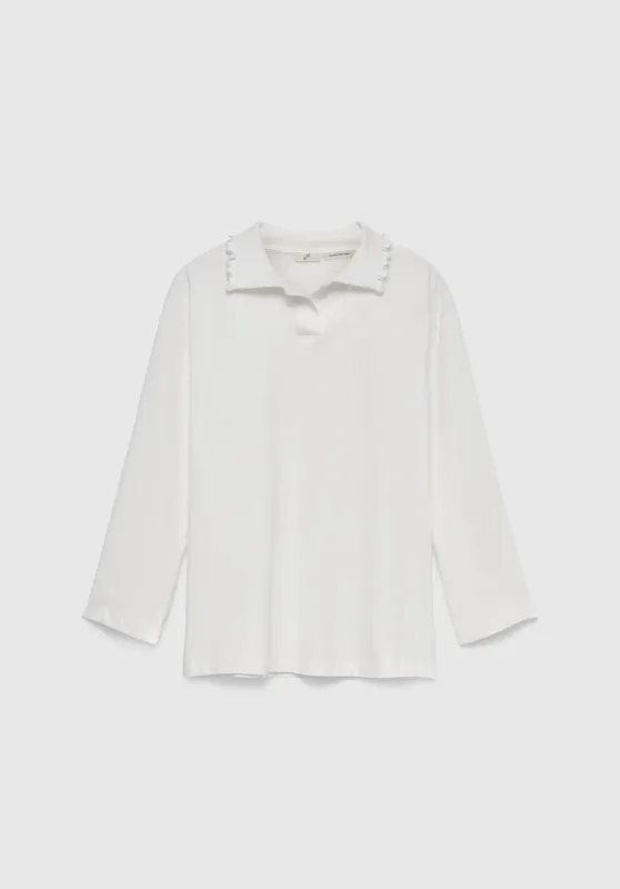 Lyra Frilled Polo sold by Bite Studios