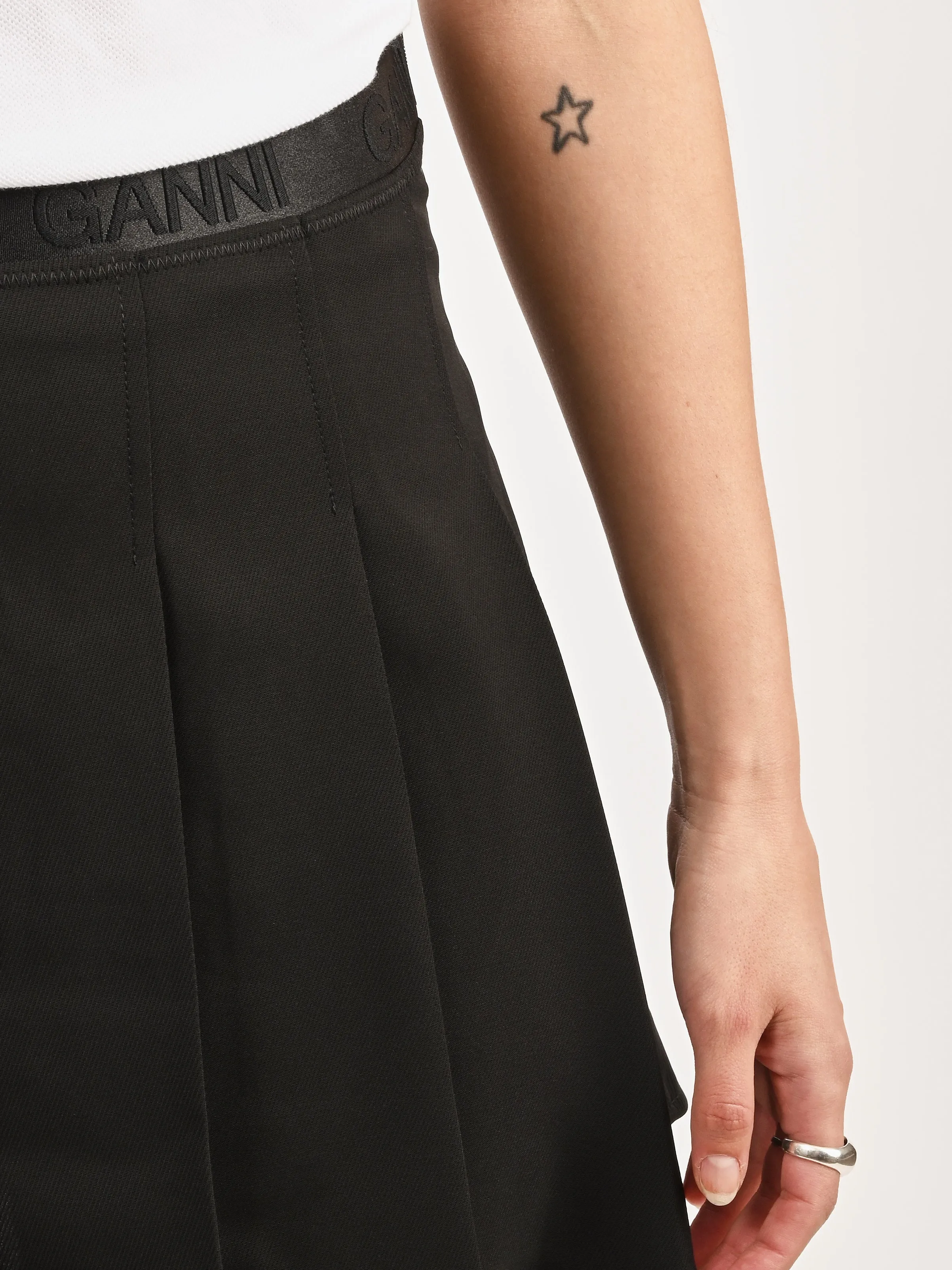 Black Light Twill Pleated Mini Skirt sold by Frances May Houseline product image thumbnail 3