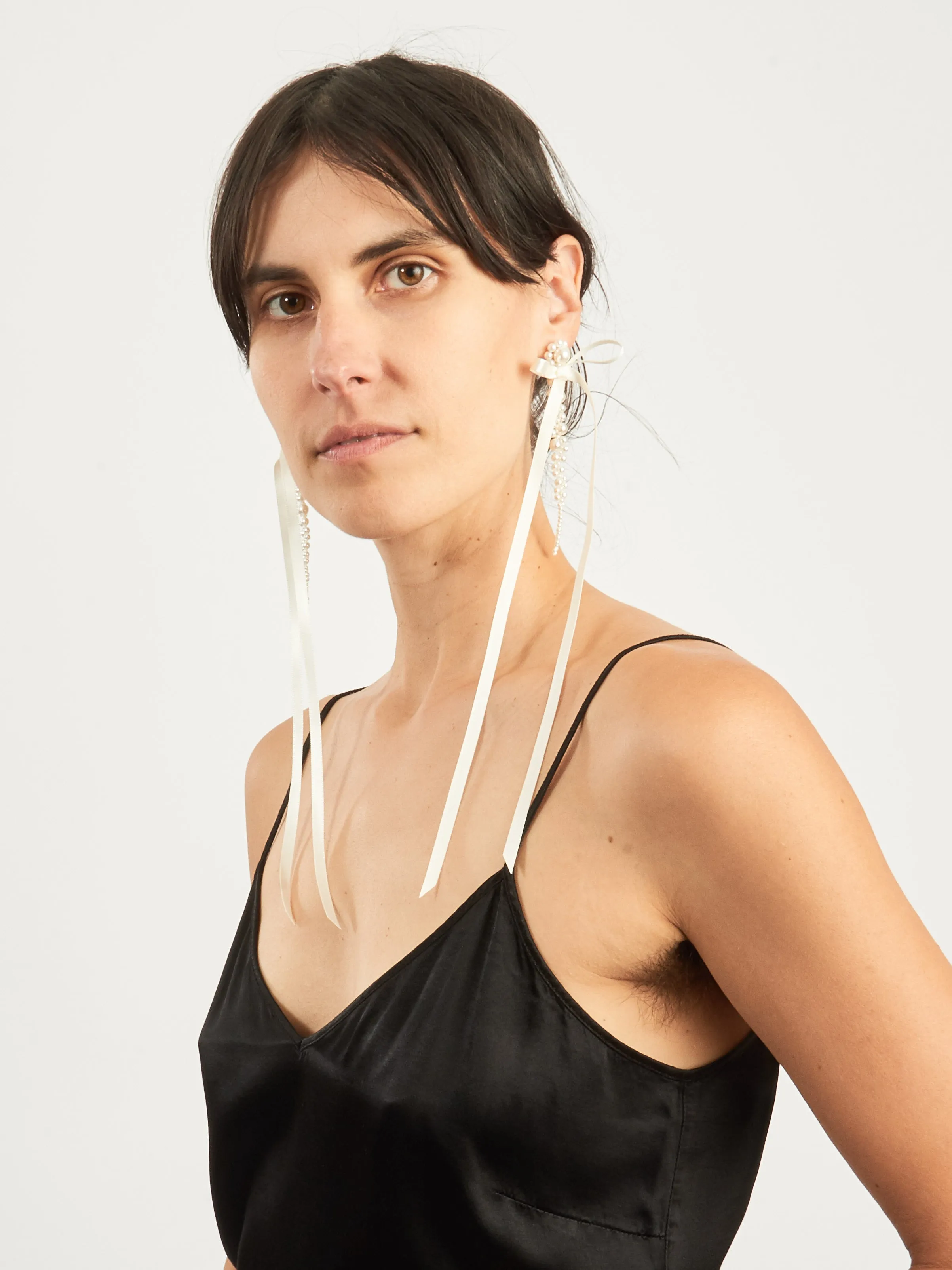 Pearl/Ivory Bow Ribbon Drip Earrings sold by Frances May Houseline