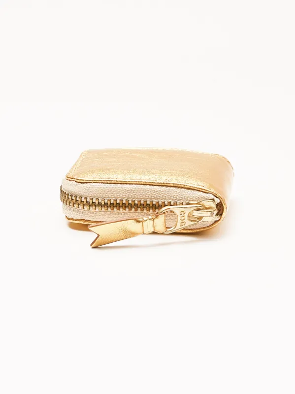 Gold Coin Pouch made by Comme des Garcons