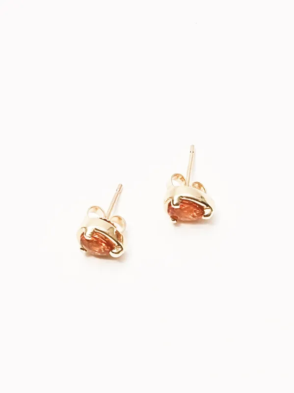 Orange Sapphire Teardrop Studs sold by Frances May Houseline