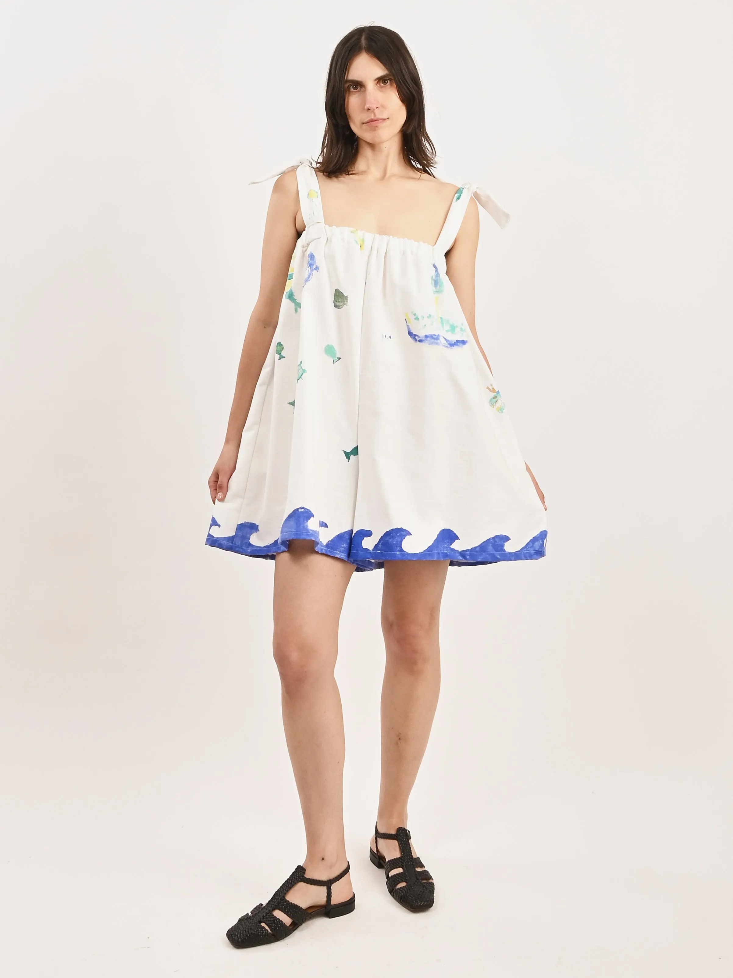 White Romper sold by Frances May Houseline