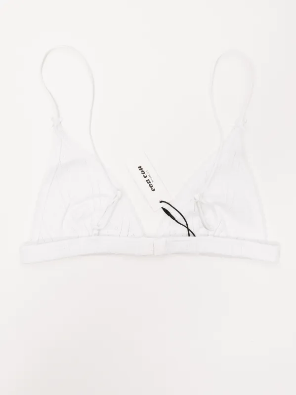 The Triangle Bralette White Pointelle sold by Frances May Houseline