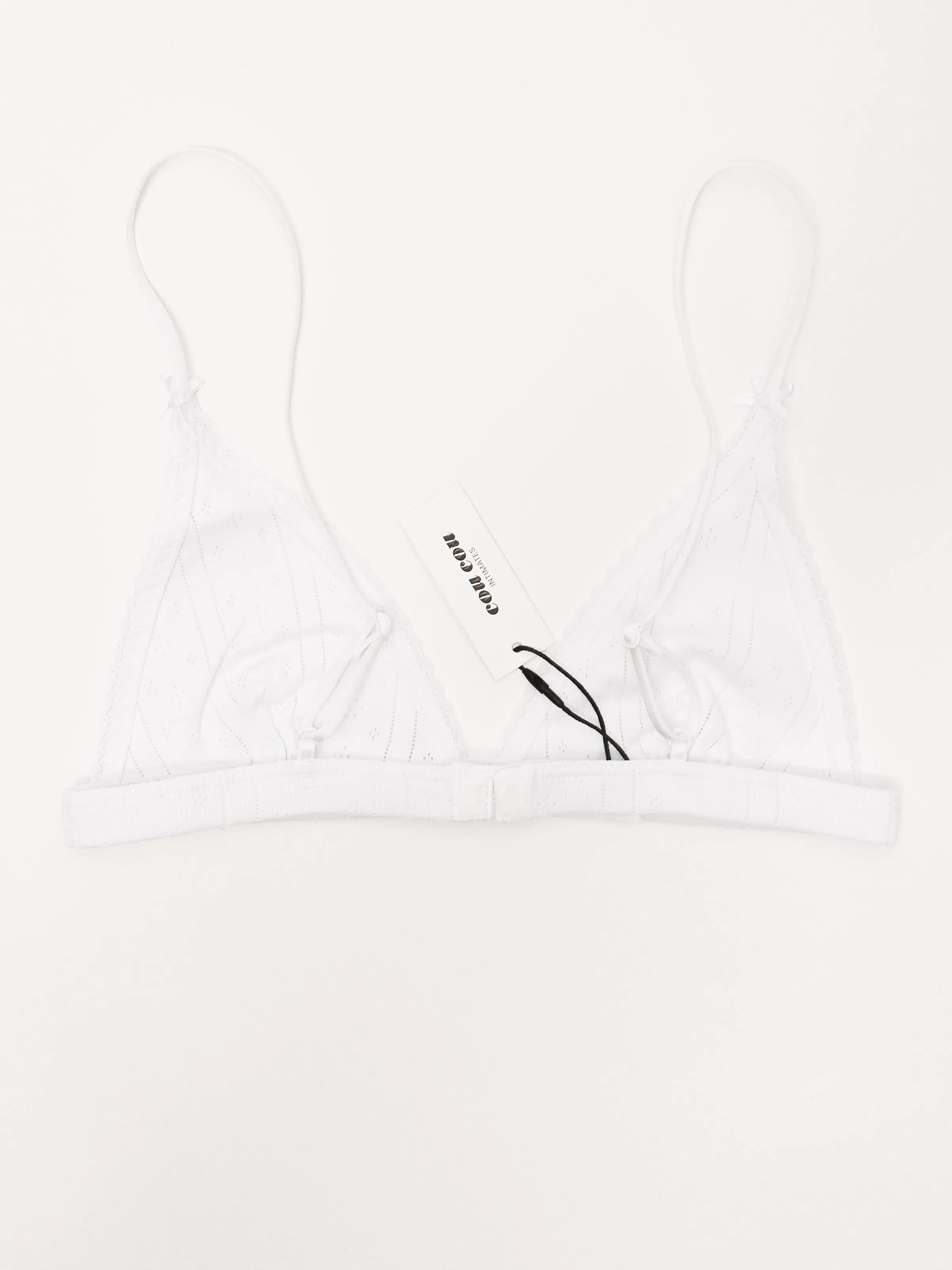 The Triangle Bralette White Pointelle sold by Frances May Houseline