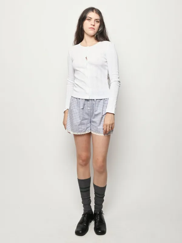 The Cardigan White Pointelle sold by Frances May Houseline