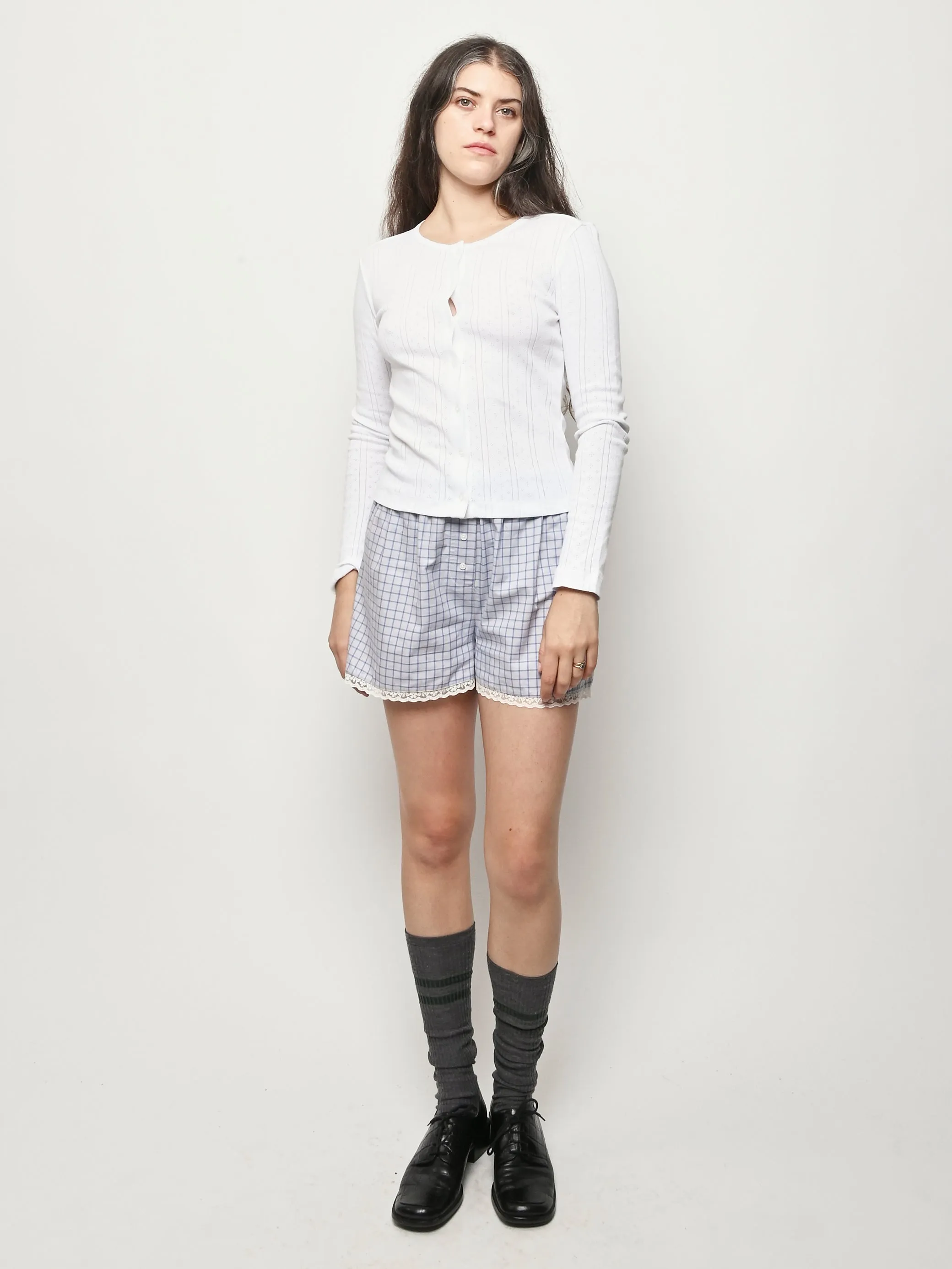 The Cardigan White Pointelle sold by Frances May Houseline