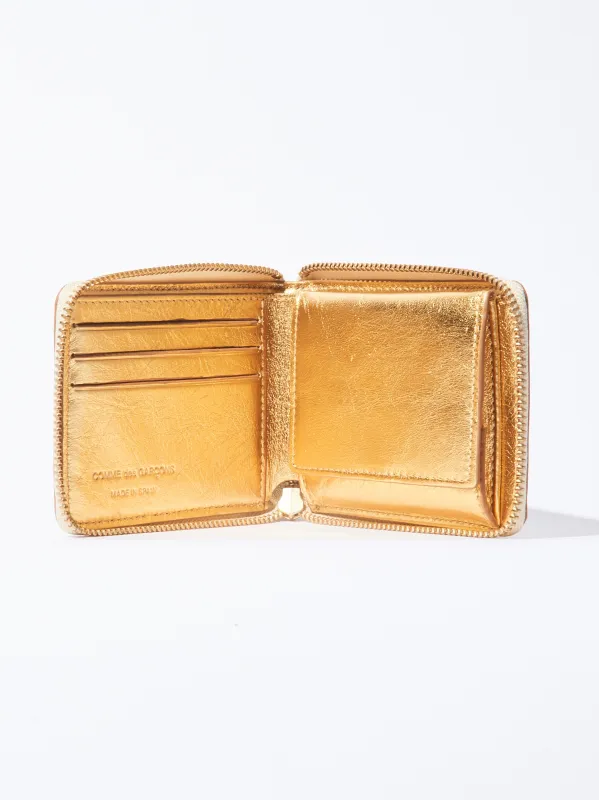 Gold Small Zip Around Wallet made by Comme des Garcons