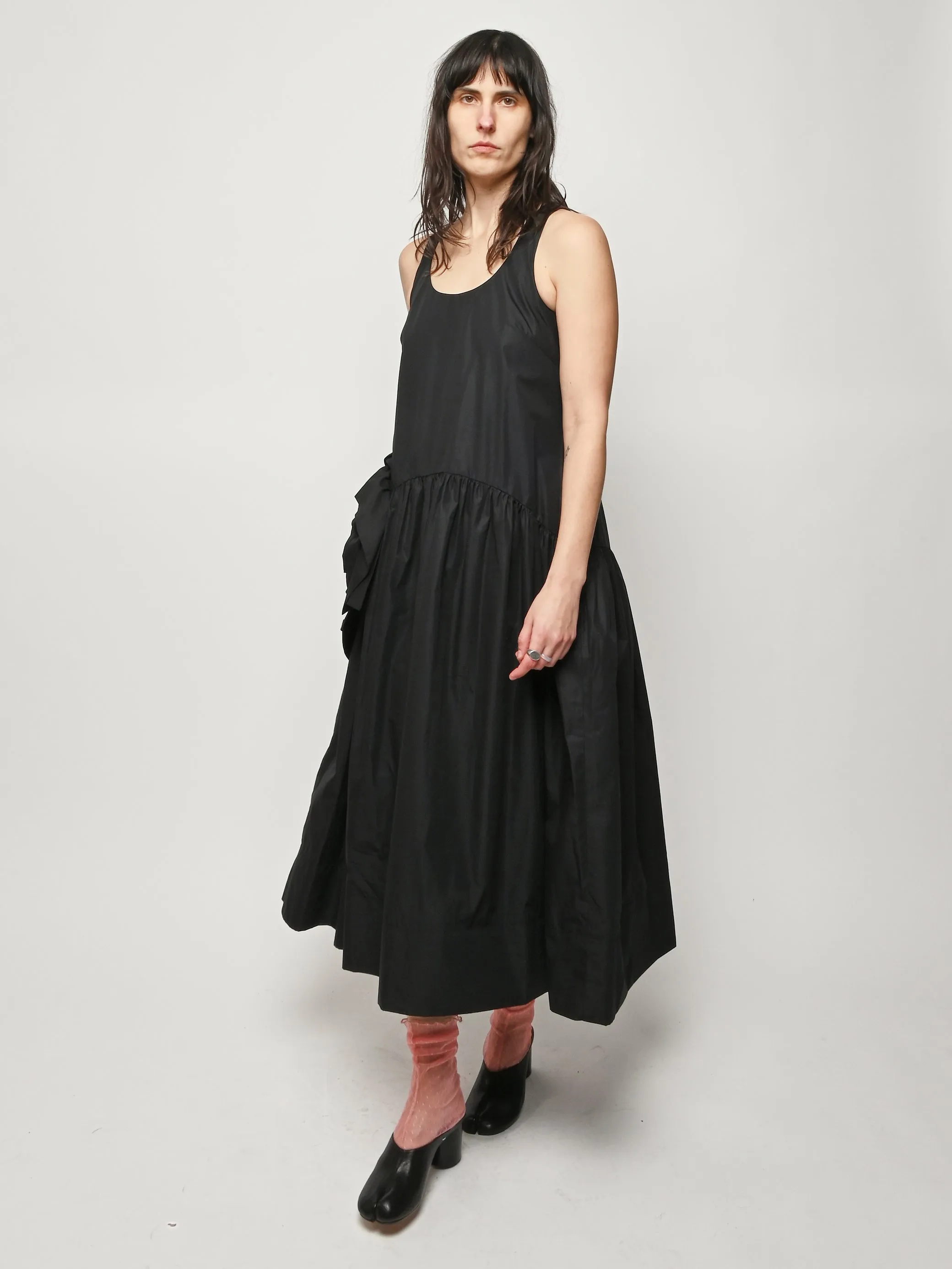 Black Pressed Rosette Tapered Back Flounce Dress sold by Frances May Houseline