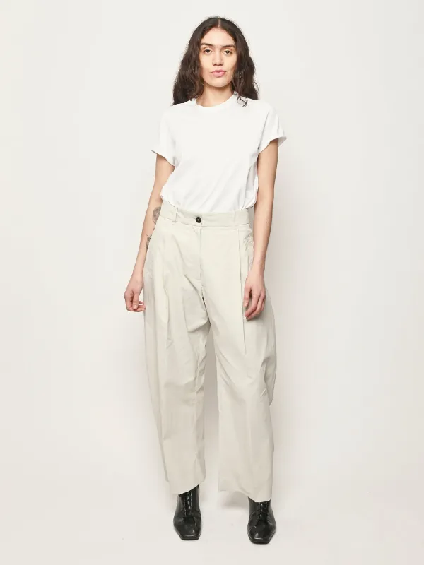 Bone Minos Single Pleat Curved Leg Pant made by Studio Nicholson
