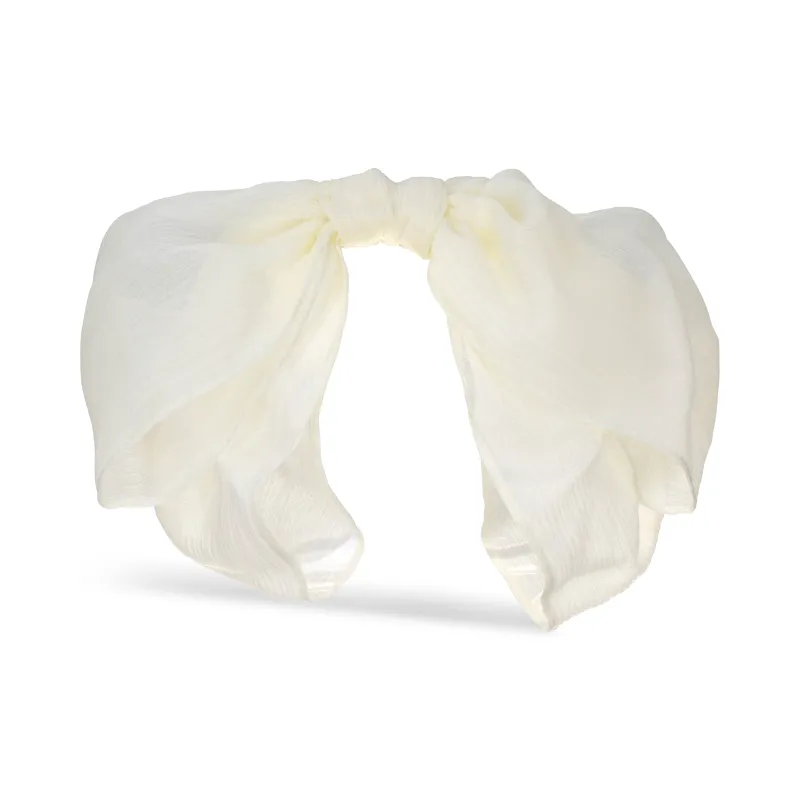 Jacqueline Bow | Ivory sold by Gigi Burris