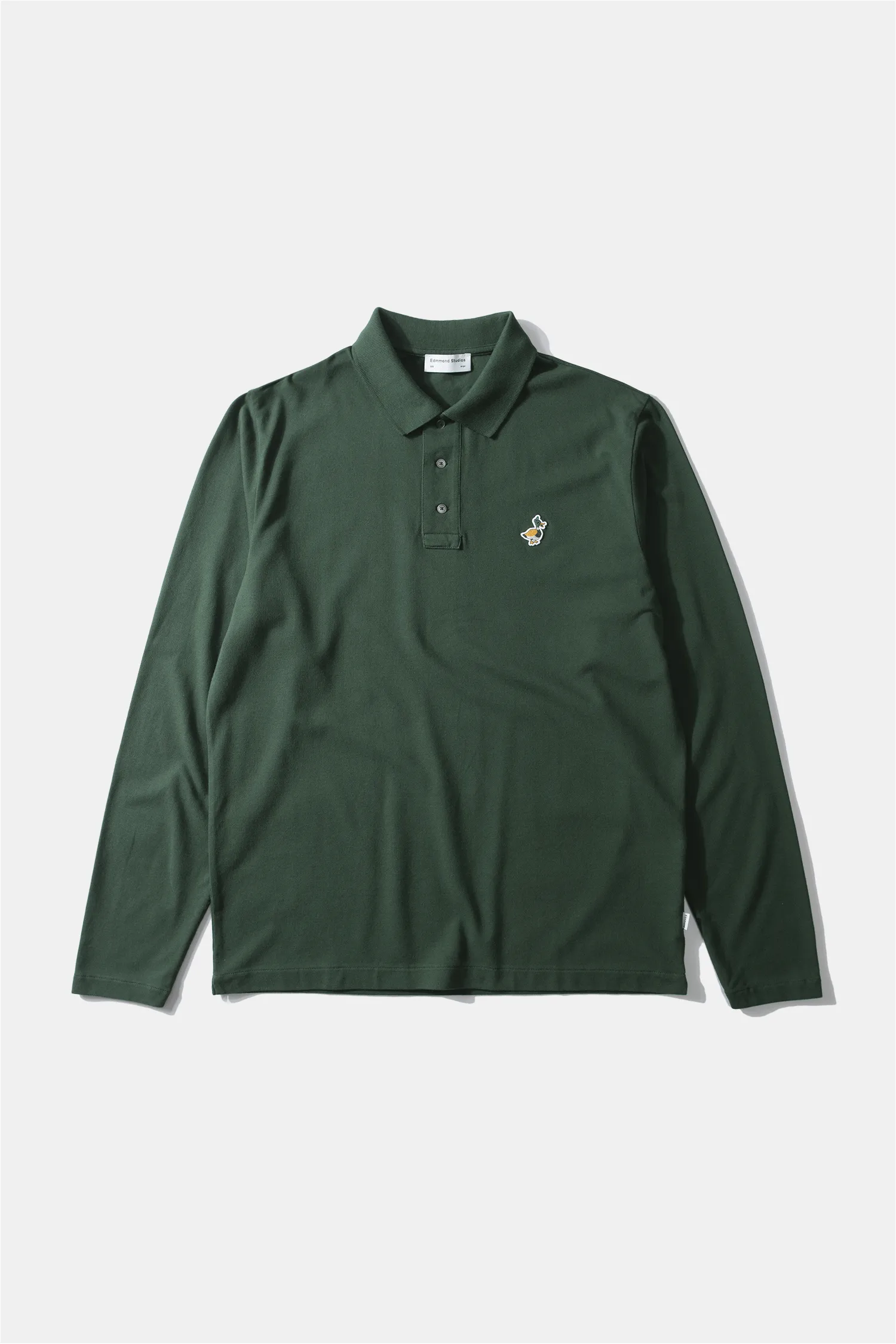 WILSON POLO LS DK GREEN sold by Edmmond Studios