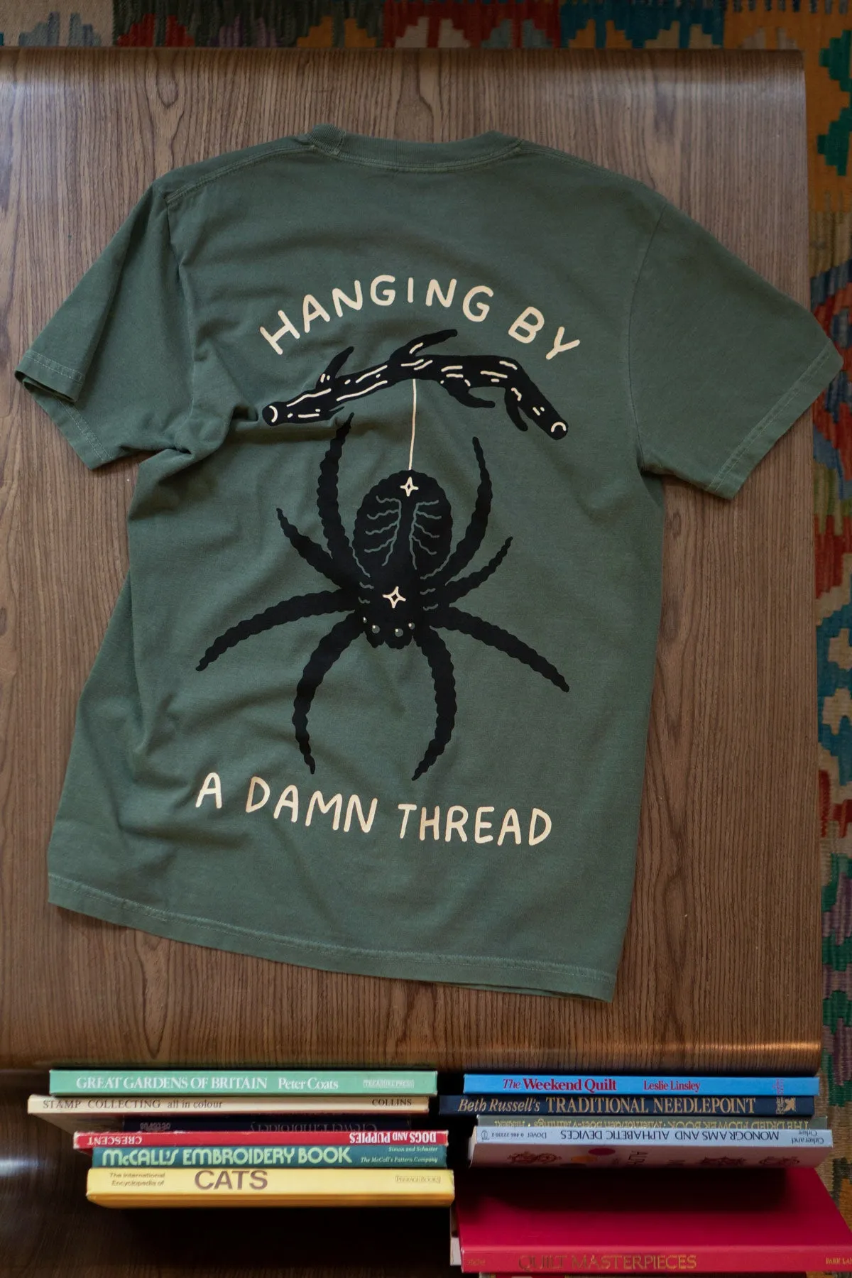Hanging by a Thread T-Shirt sold by Stay Home Club