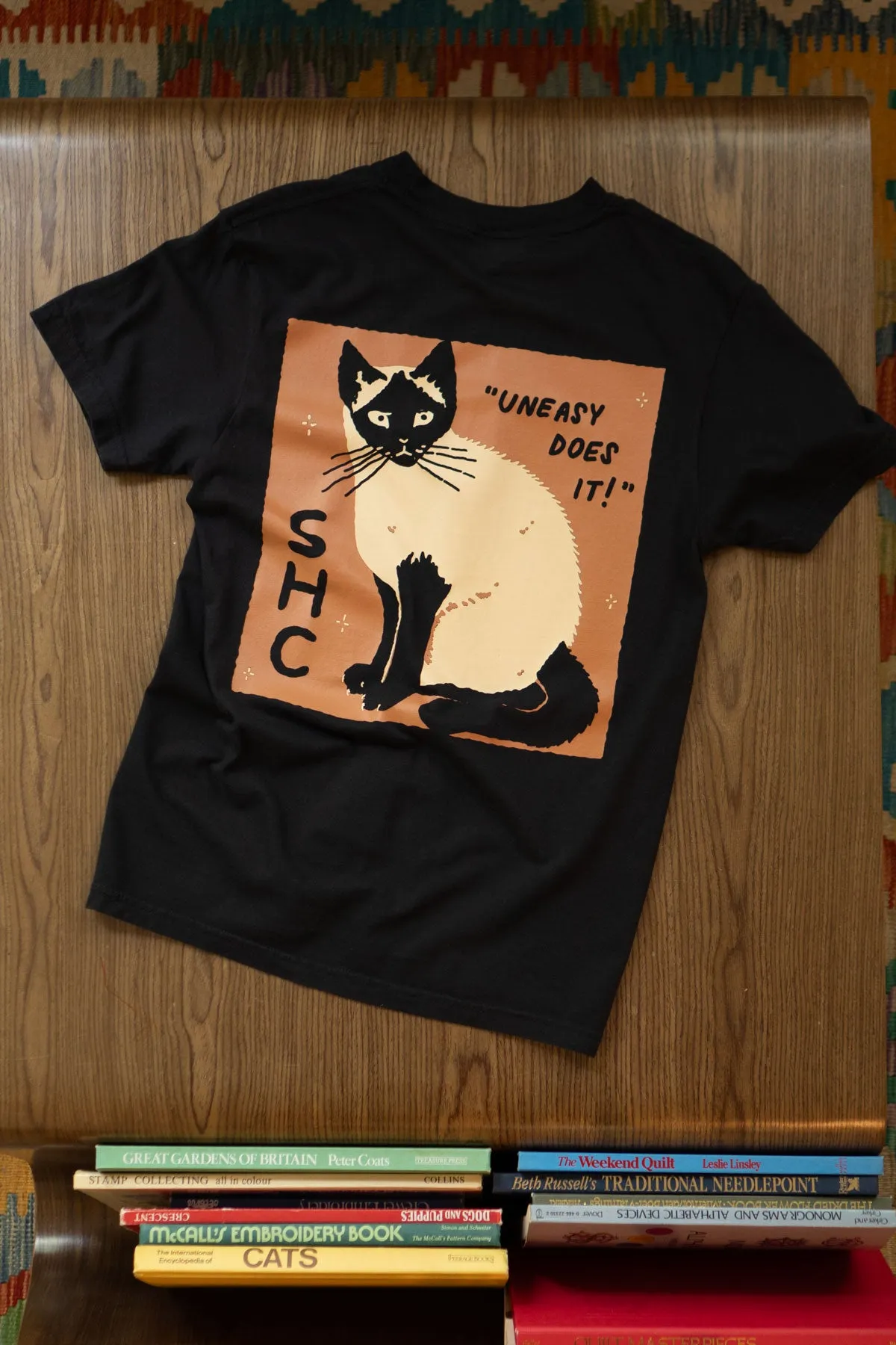 Uneasy Does It (Siamese) T-Shirt sold by Stay Home Club