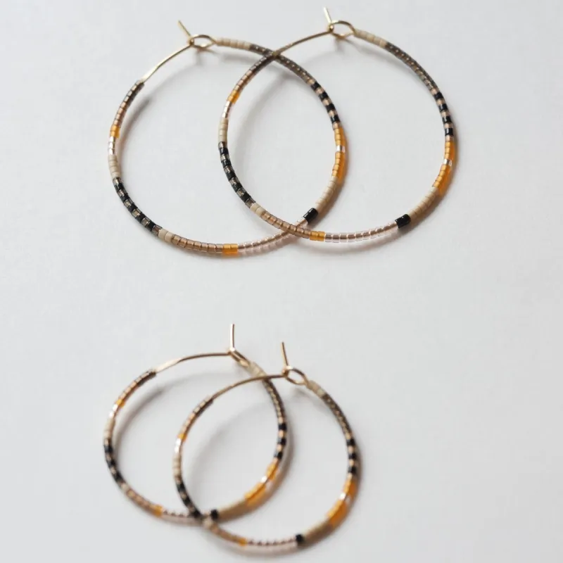 Eala - 1.25" & 1.75" 14 KT Gold Hoops sold by Daldanea