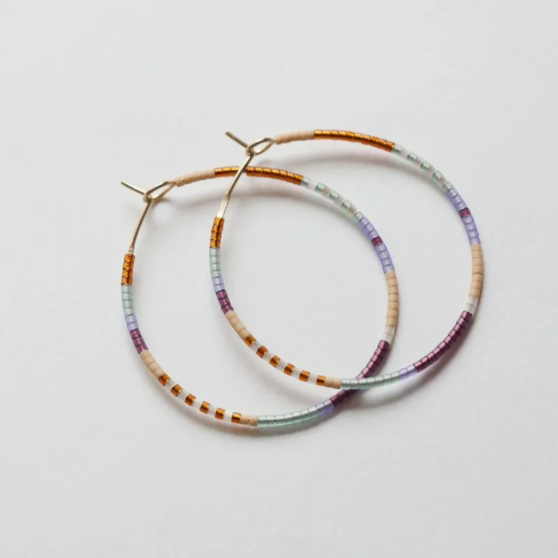 Thabi - 1.75" 14 KT Gold Hoops sold by Daldanea