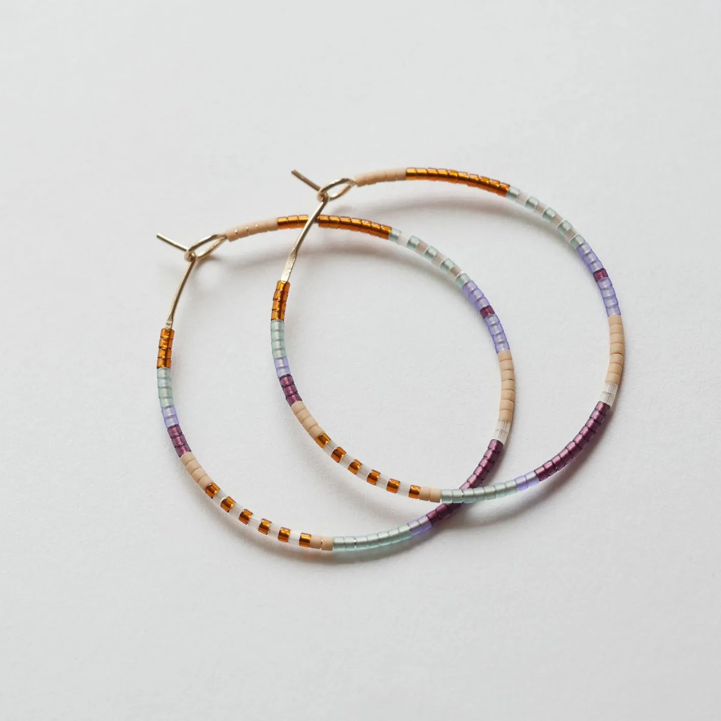 Thabi - 1.75" 14 KT Gold Hoops sold by Daldanea